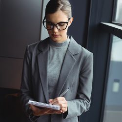 counselor-writing-on-the-notepad